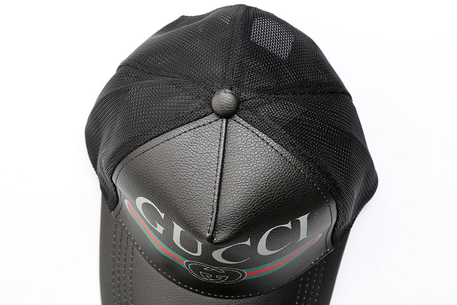 GUCCI BERRETTO LOGO IN PELLE